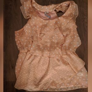 Peach polka dot sleeveless blouse